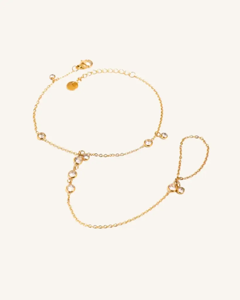 Pulsera de mano con zirconias Nimes en acero quirúrgico dorado