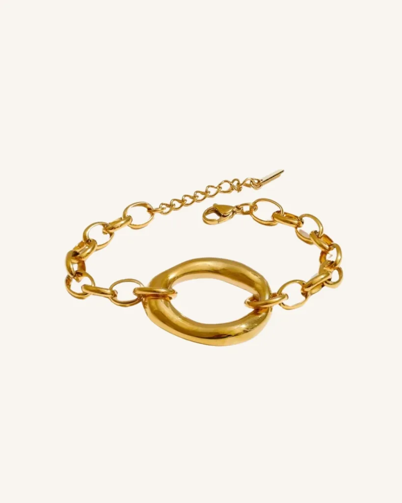 Pulsera dorada de acero quirúrgico enchapada en oro 18k con aro central